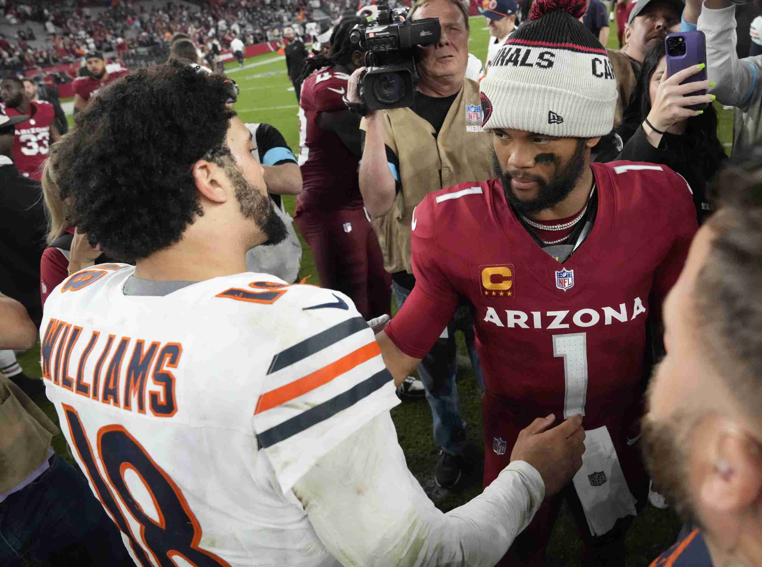 Chicago Bears quarterback Caleb Williams (18) and Arizona Cardinals quarterback Kyler Murray (1) shake hands after the Arizona Cardinals beat the Chicago Bears 29-9 at State Farm Stadium on Nov 3, 2024, in Glendale.